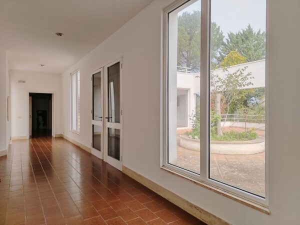 Villa immersa nel verde in zona Calendano - immagine 12